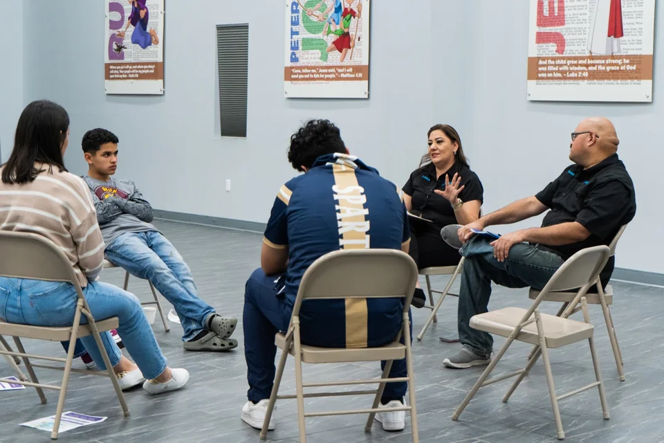 A welcoming ISGOD support circle sharing and listening together